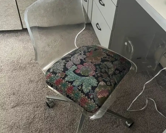 lucite wheeled chair