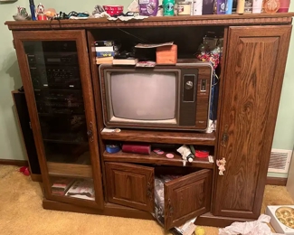 Old school entertainment center 
Working vintage tv