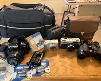 Vintage cameras $25 each
Binoculars $35
The big camera with the carry case $40
