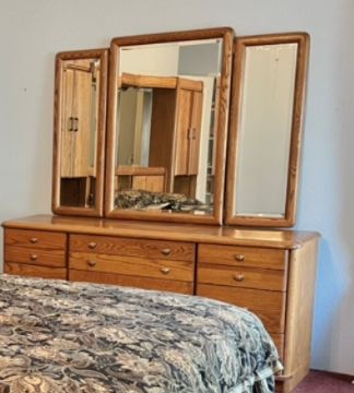 7 drawers  dresser with the mirror  64 inches long  x 18 inches deep $75. Solid wood price to sell.