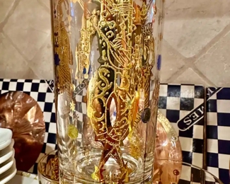 Loads of gold on this SET OF 6 “Jesters” highball glasses