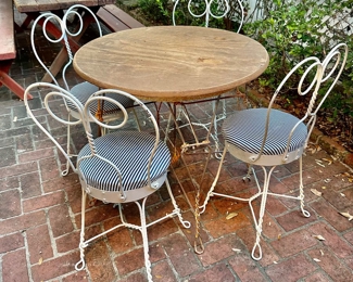 twisted metal ice cream parlor table and four chairs set