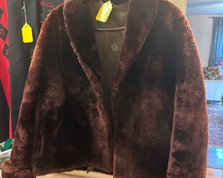A fabulous Mouton Fur jacket in chocolate brown approx M-L in size (10-12)