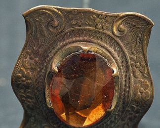 ANTIQUE WITH TOPAZ COLORED GLASS 