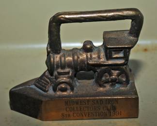 SOUVINER BRASS PAPERWEIGH