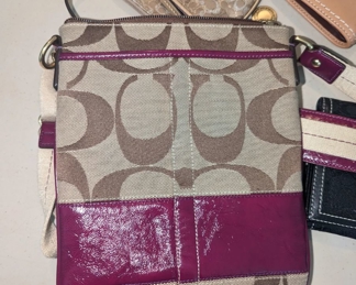 Plenty of coach wallets and purses. All new or like new