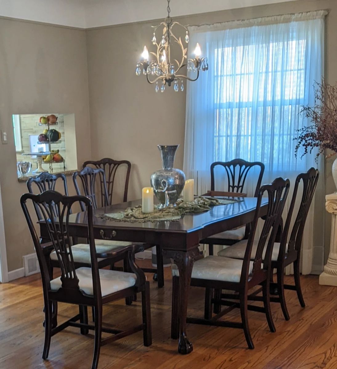 Harden Furniture Chippendale Dining Set w/Ball & Claw feet.  Seats up to 12-14 people. Solid Mahogany w/ cherry finish, sculpted corners & beveled edging & carved legs  64 x 44 x 29.5 (up to 112" w/ 3 leaves attached) Includes: 2-arm chairs, 6 side chairs, 3-16" leaves & storage covers, custom table pads to fit full length