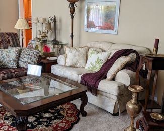 Harden Solid Mahogany cocktail table with beveled glass insert & carved legs.  White jacquard love seat. Damask upholstered arm chair