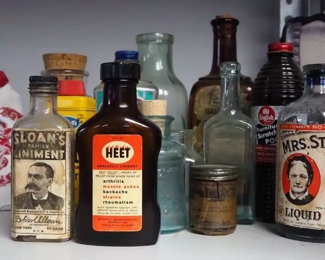 Antique Pharmaceutical Bottles And Tins Including Sloan's, Ex-Lax, Rexall Hair Tonic, Polishes And Cleaners, Vintage Tin Match Dispenser, And More