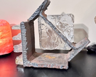 Iron and glass sculpture.