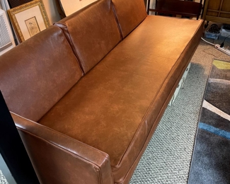 Orange vinyl couch 1 of 2