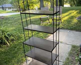 Have 4 - Fantastic metal shelving - bottom 3 shelves set out from the top. 