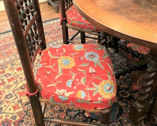 One of the 6 other chairs around the table (sold separately from the table)
