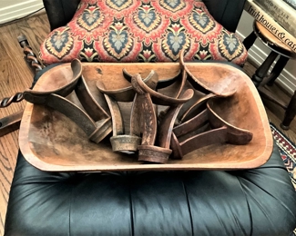 Blue leather ottoman; antique dough bowl; antique Chinese wooden head rest collection