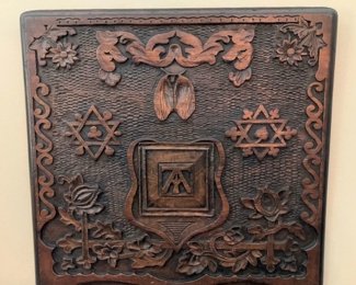 Intricately carved antique wall hanging