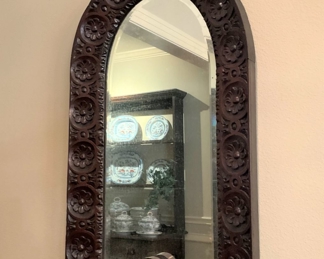 One of several antique mirrors in the home