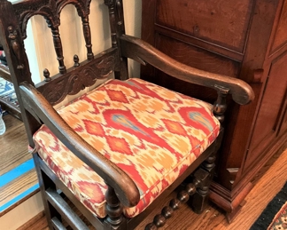 One of two matching antique chairs