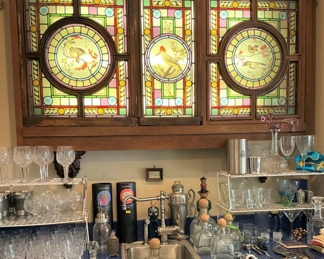 Outstanding stained glass cabinets (You are responsible for removing.); glassware; barware