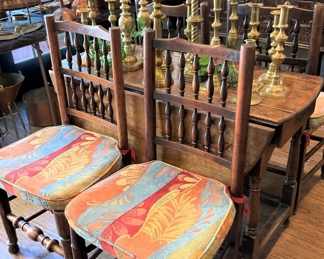 4 matching antique chairs; antique drop leaf table; many brass candlesticks