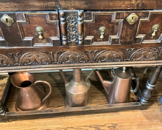 Beautiful carving; copper pitchers