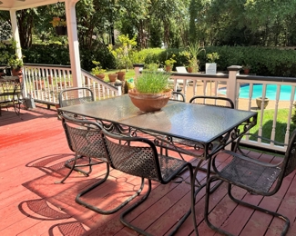 Glass top rectangular patio table with 6 chairs