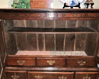 Inside the antique storage cabinet