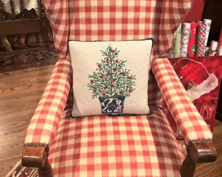 Red and white checked chair; Christmas pillow