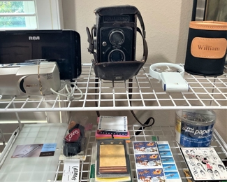 Cameras; "William" drink holder