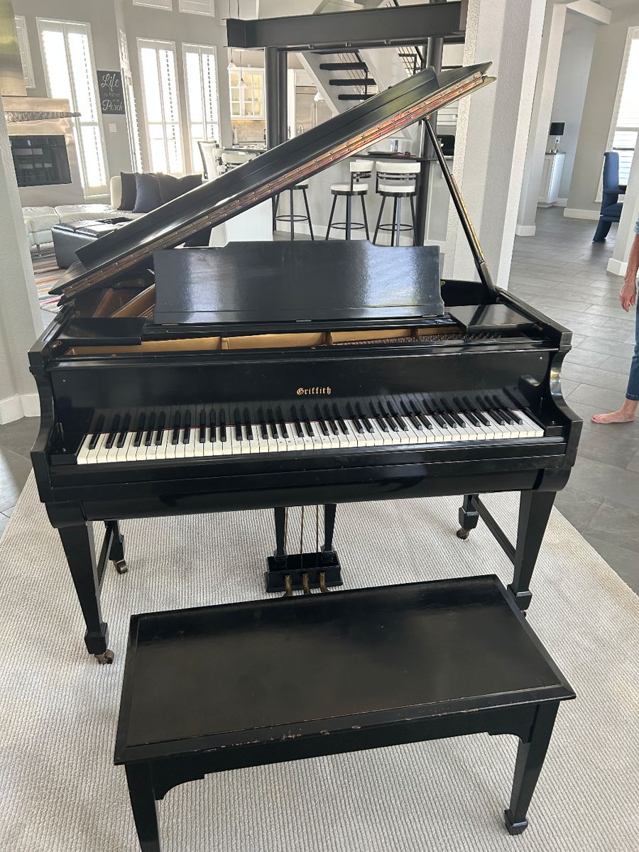 Griffith baby grand piano 1940s made by Steinway. Prior the piano was a player piano and was refurbished. Will Pre-sell $4000 obo