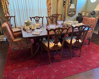Mahogany formal dining table with 6 Chippendale chairs, 2 leaves and matching Breakfront!