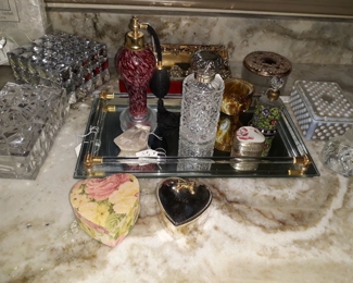 Perfume bottles and jewelry boxes.