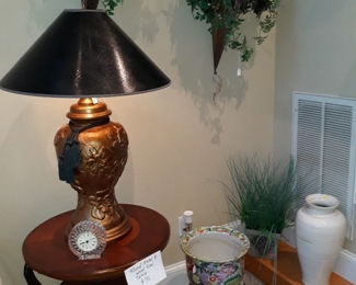 Flora, lamp, table, oriental planter on stand, vase, and faux plant