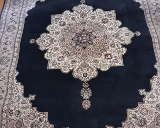 Wool rug, machine made.