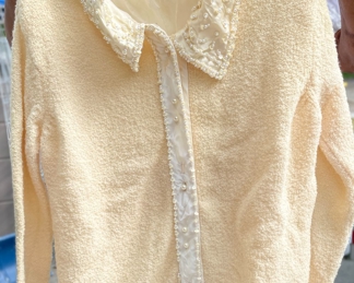 Hundreds of pieces of lovely name brand clothing, freshly laundered and ready to go 