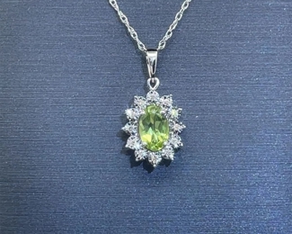 Oval Cut Peridot & Diamond Miracle Halo Cluster Pendant Necklace in White Gold
