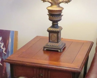 Stanley Furniture end table, hunting VHS videos