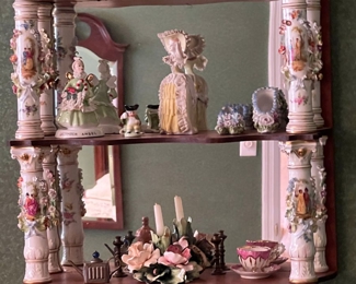 Mirrored back curio wall mounted shelf