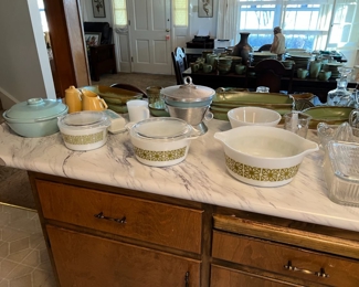 Pyrex "Autumn Floral Verde" dishes, Pyrex "Butterprint" butter dish, Fire King ice bucket, La Solana pottery