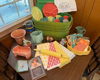 vintage picnic basket with melamine dinner set, McCoy pottery pieces
