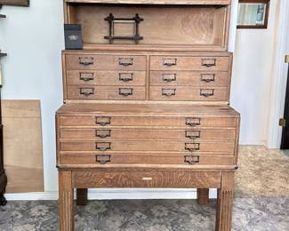 Specialized filing cabinet for flat sheet storage 4 pieces…top has glass pull down rare to find quality piece