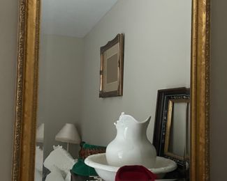 Gold tone framed mirror