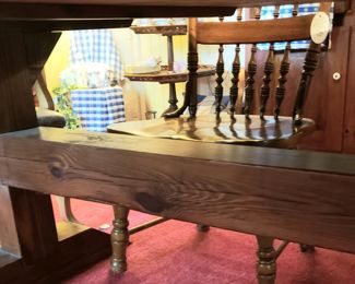 underneath massive custom made pine table