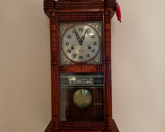 Hand carved wall pendulum clock with key
