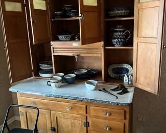 Antique Hoosier cabinet with slag glass