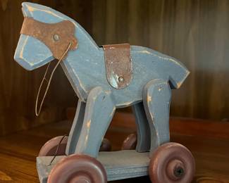 small primitive wooden horse