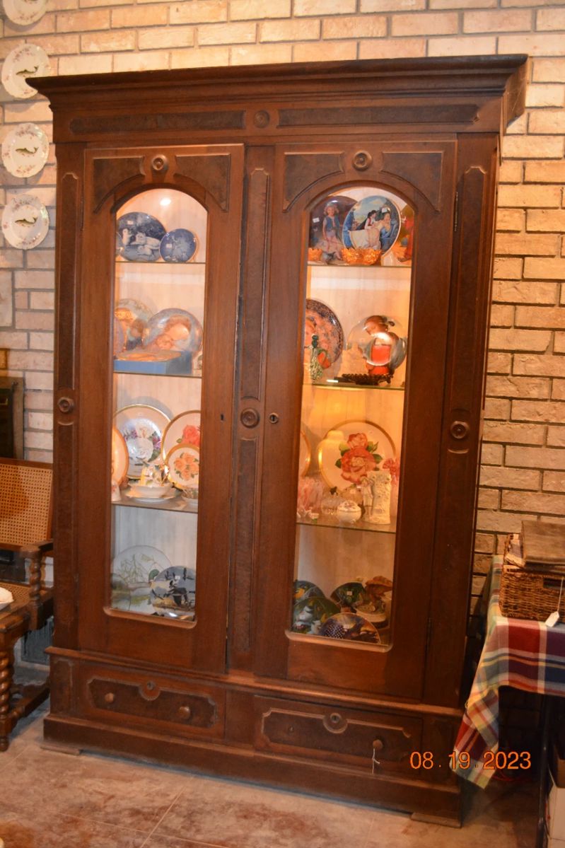 one of 2 matching antique display cabinets