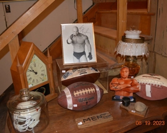 autographed memorabilia - antique clock and oil lamp