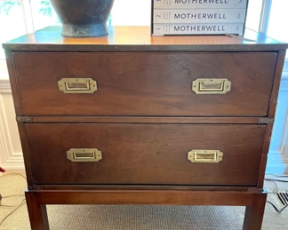 SOLD: 33"x 18" x 32"; Mid-Century campaign-style, two-drawer chest with brass hardware, brass edging around the entire top, and bracket feet. One piece. 