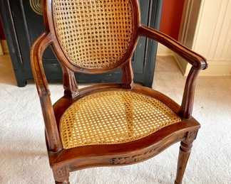 $500 each (2 available); 23" x 18" x 36"; Italian-crafted elegant arm chair with double-caned back, caned seat, custom cushion and carved details (view with no cushion)                                                                                                       $400 each (8 available); 21" x 17" x 36"; matching Italian-crafted dining chairs with double-caned back, caned seat, custom cushion and carved details