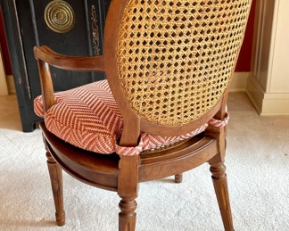 $500 each (2 available); 23" x 18" x 36"; Italian-crafted elegant arm chair with double-caned back, caned seat, custom cushion and carved details (back view)                                                           $400 each (8 available); 21" x 17" x 36"; matching Italian-crafted dining chairs with double-caned back, caned seat, custom cushion and carved details